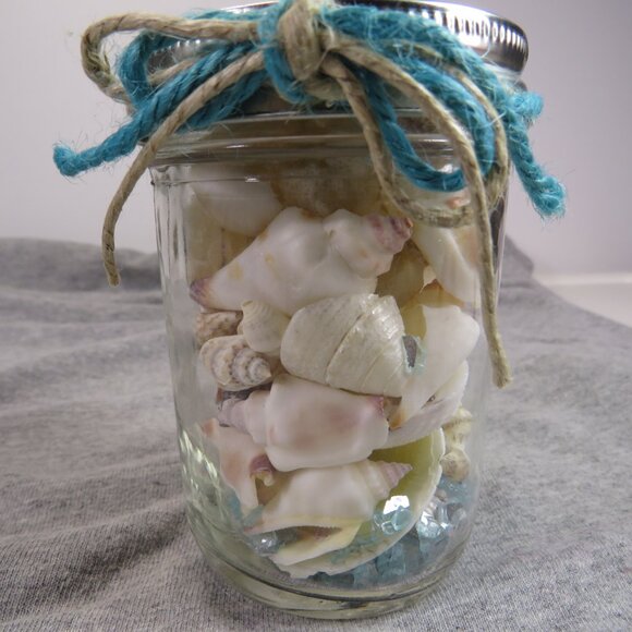 Jar of REAL sea shells and with blue sparkly vase filler at bottom - Picture 1 of 13
